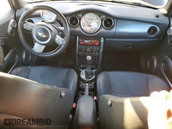 2007 MINI Convertible with VIN WMWRF33597TG16707, listed as a Copart auction lot 79104014 with 113,380 mi miles and Salvage Title. Bid and sale history available at DreamBid. Image 8.