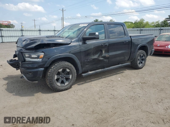 2019 Ram 1500 Rebel z VIN 1C6SRFLT8KN618140, wystawiony jako Copart lot #54734815 z przebiegiem 145 040 mil mil oraz Szkoda całkowita • Salvage title. Historia ofert i sprzedaży dostępna na DreamBid. Obrazek 1.