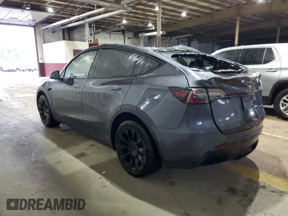2023 Tesla Model Y Long Range z VIN 7SAYGDEE8PF814874, wystawiony jako Copart lot #56546365 z przebiegiem 20 919 mil mil oraz Szkoda całkowita • Salvage title. Historia ofert i sprzedaży dostępna na DreamBid. Obrazek 2.