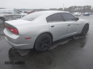 2014 Dodge Charger Police with VIN 2C3CDXAG1EH282873, listed as a IAAI auction lot 41272037 with 133,502 mi miles and . Bid and sale history available at DreamBid. Image 4.