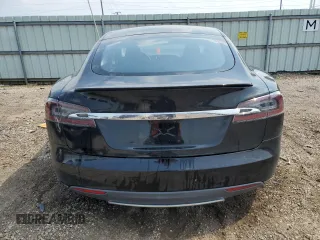 2014 Tesla Model S 60 with VIN 5YJSA1H11EFP36611, listed as a Copart auction lot 59544085 with 97,214 mi miles and Salvage title. Bid and sale history available at DreamBid. Image 6.
