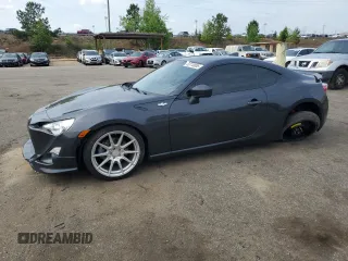 2016 Scion FR-S z VIN JF1ZNAA11G8702335, wystawiony jako Copart lot #53110855 z przebiegiem 63 780 mil mil oraz Szkoda całkowita • Salvage title. Historia ofert i sprzedaży dostępna na DreamBid. Obrazek 1.