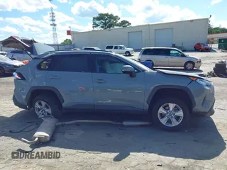 2020 Toyota RAV4 XLE with VIN 2T3W1RFV0LC081789, listed as a IAAI auction lot 42272557 with 91,399 mi miles and . Bid and sale history available at DreamBid. Image 13.