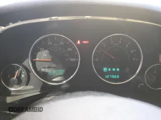 2013 Jeep Wrangler Unlimited Rubicon 10th Anniversary with VIN 1C4HJWFG4DL549065, listed as a Copart auction lot 75899594 with 127,960 mi miles and Salvage title. Bid and sale history available at DreamBid. Image 9.
