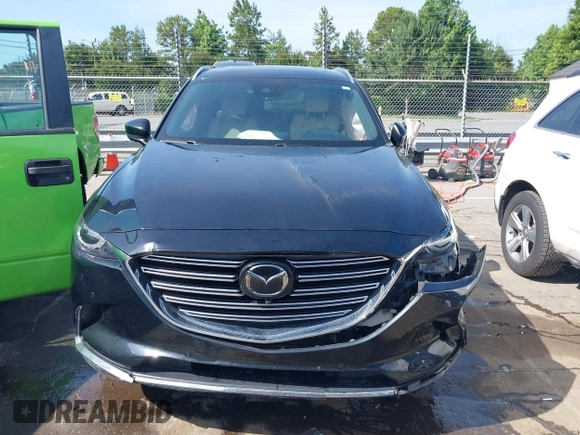 2021 Mazda CX-9 Carbon Edition with VIN JM3TCBDY3M0524241, listed as a IAAI auction lot 42538127 with 50,533 mi miles and . Bid and sale history available at DreamBid. Image 12.