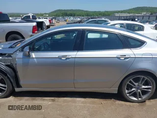 2020 Ford Fusion SEL with VIN 3FA6P0CDXLR196124, listed as a IAAI auction lot 42244231 with 99,306 mi miles and . Bid and sale history available at DreamBid. Image 15.