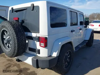 2016 Jeep Wrangler Unlimited 75th Anniversary with VIN 1C4BJWEG3GL194420, listed as a IAAI auction lot 41678849 with 127,194 mi miles. Bid and sale history available at carsss.com. Image 4.