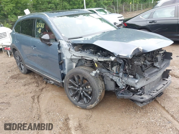 2022 Mazda CX-9 Grand Touring with VIN JM3TCBDY0N0615968, listed as a IAAI auction lot 42312159 with 22,912 mi miles and . Bid and sale history available at DreamBid. Image 1.