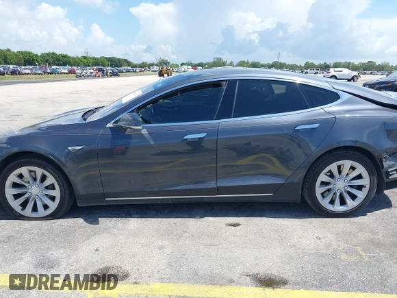 2016 Tesla Model S 70 with VIN 5YJSA1E16GF156312, listed as a IAAI auction lot 42469451 with 90,317 mi miles and . Bid and sale history available at DreamBid. Image 15.