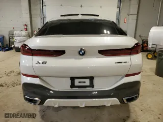 2020 BMW X6 xDrive40i with VIN 5UXCY6C07L9B43453, listed as a Copart auction lot 52096845 with 0 mi miles and Salvage Title. Bid and sale history available at carsss.com. Image 6.