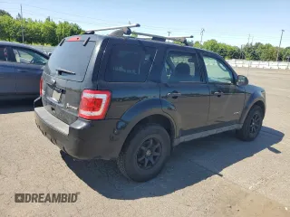 2010 Ford Escape Hybrid with VIN 1FMCU4K38AKC98072, listed as a Copart auction lot 58192375 with 123,958 mi miles and Salvage title. Bid and sale history available at DreamBid. Image 3.
