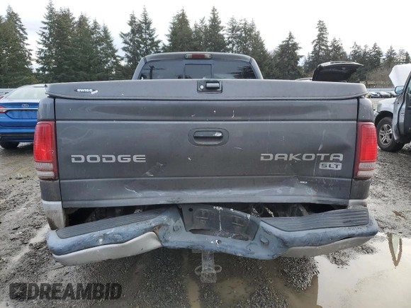 2003 Dodge Dakota SLT with VIN 1D7HL42X33S328572, listed as a Copart auction lot 43112125 with 0 mi miles and Salvage Title. Bid and sale history available at carsss.com. Image 6.