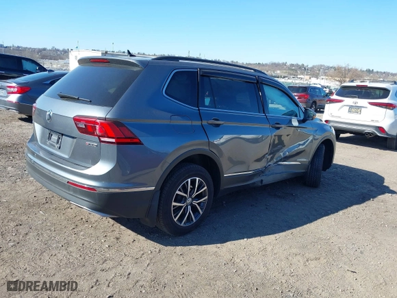 2020 Volkswagen Tiguan SE with VIN 3VV2B7AX8LM119358, listed as a IAAI auction lot 41897534 with 131,646 mi miles. Bid and sale history available at carsss.com. Image 4.