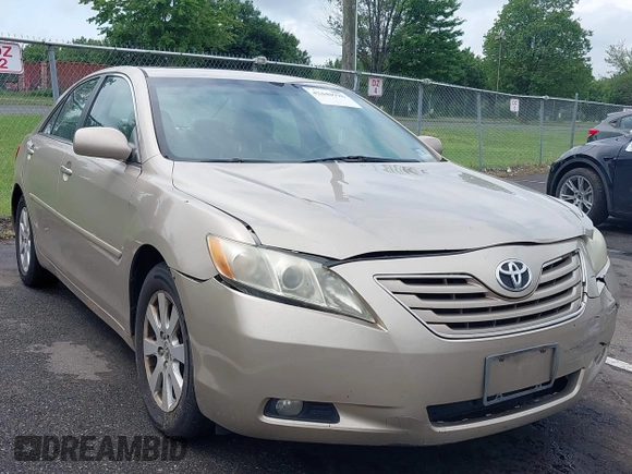 2009 Toyota Camry LE z VIN 4T1BK46KX9U089242, wystawiony jako IAAI lot #42448998 z przebiegiem 252 787 mil mil oraz . Historia ofert i sprzedaży dostępna na DreamBid. Obrazek 1.