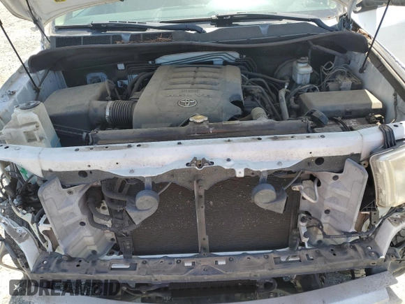 2012 Toyota Tundra with VIN 5TFRM5F14CX039145, listed as a Copart auction lot 56520015 with 129,114 mi miles and Salvage title. Bid and sale history available at DreamBid. Image 11.