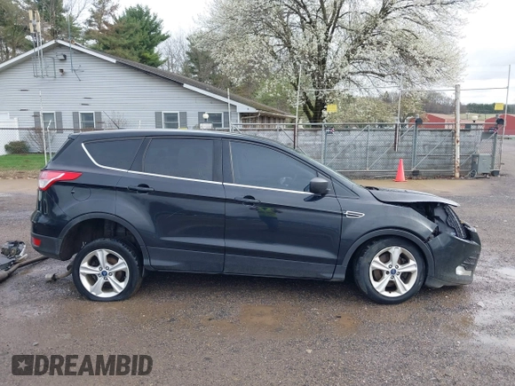 2013 Ford Escape SE with VIN 1FMCU9GX9DUD34661, listed as a IAAI auction lot 41945565 with 239,752 mi miles and . Bid and sale history available at DreamBid. Image 13.