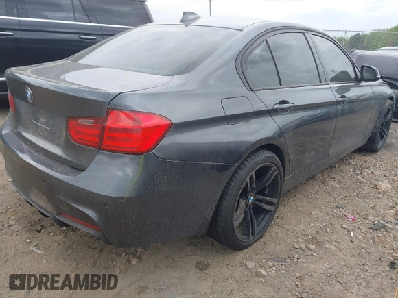 2013 BMW 3 Series 328i xDrive with VIN WBA3B5C54DF591428, listed as a IAAI auction lot 41977206 with 143,473 mi miles. Bid and sale history available at carsss.com. Image 4.