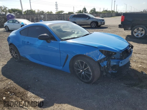 2023 Toyota GR86 with VIN JF1ZNBC11P8758861, listed as a Copart auction lot 77705634 with 11,684 mi miles and Salvage Title. Bid and sale history available at carsss.com. Image 4.