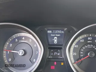 2014 Hyundai Elantra GT with VIN KMHD35LH6EU180152, listed as a IAAI auction lot 41674456 with 113,763 mi miles. Bid and sale history available at carsss.com. Image 7.