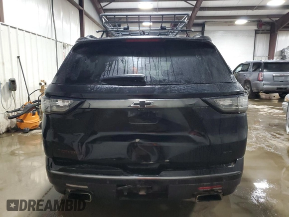 2020 Chevrolet Traverse Premier with VIN 1GNEVKKW3LJ310766, listed as a Copart auction lot 42061655 with 103,813 mi miles and Salvage Title. Bid and sale history available at carsss.com. Image 6.