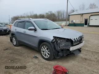2014 Jeep Cherokee Latitude with VIN 1C4PJLCS5EW169008, listed as a Copart auction lot 51999135 with 180,153 mi miles and Salvage Title. Bid and sale history available at DreamBid. Image 4.