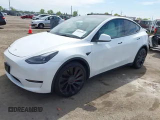 2021 Tesla Model Y Performance z VIN 5YJYGDEF7MF277769, wystawiony jako IAAI lot #42025157 z przebiegiem 28 522 mil mil oraz . Historia ofert i sprzedaży dostępna na DreamBid. Obrazek 2.