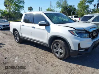 2021 Honda Ridgeline RTL-E with VIN 5FPYK3F7XMB011525, listed as a IAAI auction lot 41774012 with 98,031 mi miles and . Bid and sale history available at DreamBid. Image 1.