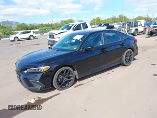 2022 Honda Civic Sport with VIN 2HGFE2F50NH599027, listed as a IAAI auction lot 41604042 with 43,250 mi miles. Bid and sale history available at carsss.com. Image 2.