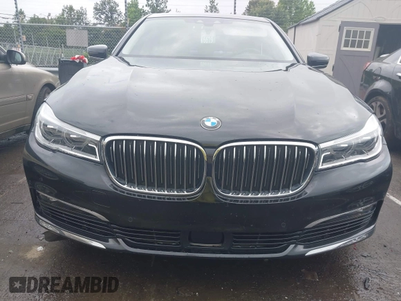 2018 BMW 7 Series 750i z VIN WBA7F0C59JGM23945, wystawiony jako IAAI lot #42236737 z przebiegiem 65 576 mil mil oraz . Historia ofert i sprzedaży dostępna na DreamBid. Obrazek 12.