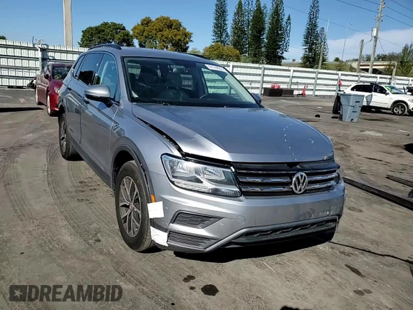 2020 Volkswagen Tiguan SE z VIN 3VV3B7AX8LM036808, wystawiony jako Copart lot #42124825 z przebiegiem 116 297 mil mil oraz Nie do naprawy. Historia ofert i sprzedaży dostępna na DreamBid. Obrazek 12.