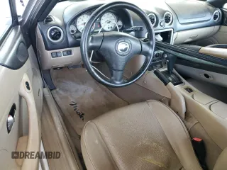 2004 Mazda MX-5 Miata LS z VIN JM1NB353X40404238, wystawiony jako Copart lot #61601895 z przebiegiem 110 549 mil mil oraz Szkoda całkowita • Salvage title. Historia ofert i sprzedaży dostępna na DreamBid. Obrazek 8.
