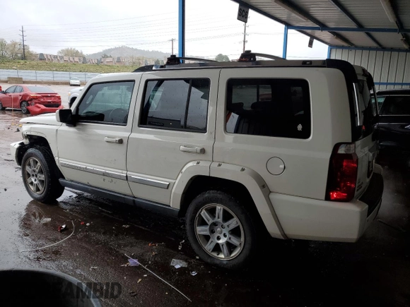 2010 Jeep Commander Limited with VIN 1J4RG5GT0AC137563, listed as a Copart auction lot 54178235 with 146,196 mi miles and Salvage title. Bid and sale history available at DreamBid. Image 2.