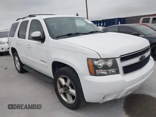2007 Chevrolet Tahoe LTZ with VIN 1GNFC13027J402178, listed as a IAAI auction lot 41605898 with 203,677 mi miles and . Bid and sale history available at DreamBid. Image 1.