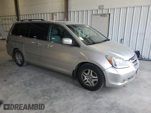 2007 Honda Odyssey EX with VIN 5FNRL38477B429624, listed as a Copart auction lot 53961825 with 144,957 mi miles and Salvage Title. Bid and sale history available at DreamBid. Image 4.