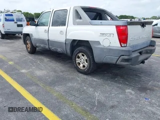 2004 Chevrolet Avalanche Z71 with VIN 3GNEK12T54G209885, listed as a IAAI auction lot 41955338 with 243,811 mi miles. Bid and sale history available at carsss.com. Image 3.