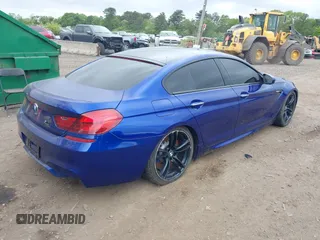 2014 BMW M6 z VIN WBS6C9C54EDV73943, wystawiony jako IAAI lot #42294944 z przebiegiem 129 823 mil mil oraz . Historia ofert i sprzedaży dostępna na DreamBid. Obrazek 4.