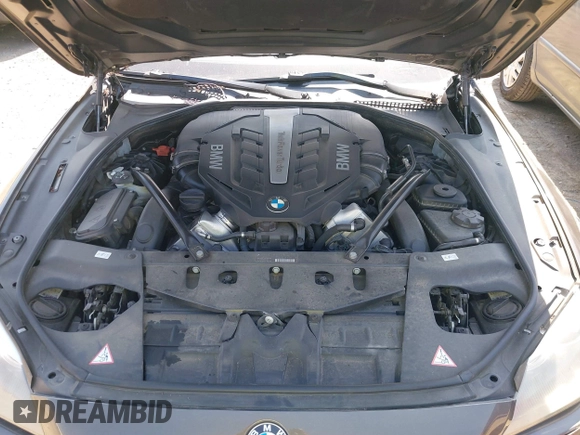 2012 BMW 6 Series 650i z VIN WBALX3C57CC528832, wystawiony jako IAAI lot #41779268 z przebiegiem 75 119 mil mil oraz . Historia ofert i sprzedaży dostępna na DreamBid. Obrazek 10.