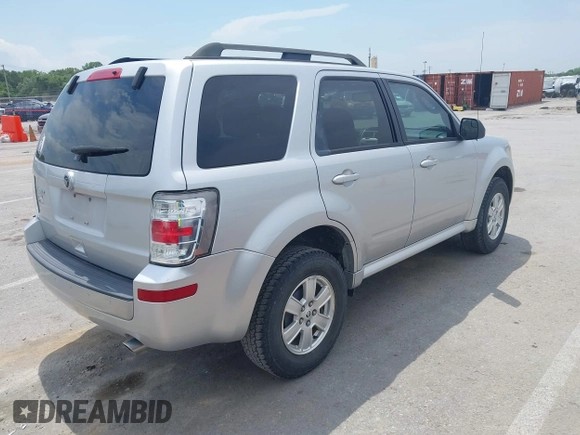 2010 Mercury Mariner with VIN 4M2CN8B77AKJ29263, listed as a IAAI auction lot 42865830 with 138,528 mi miles and . Bid and sale history available at DreamBid. Image 4.