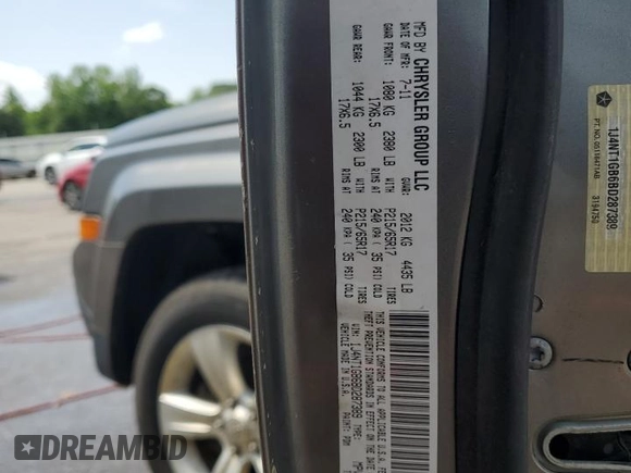 2011 Jeep Patriot Sport with VIN 1J4NT1GB6BD287389, listed as a Copart auction lot 56495085 with 188,650 mi miles and Salvage title. Bid and sale history available at DreamBid. Image 13.