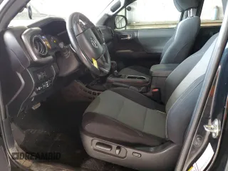 2020 Toyota Tacoma SR5 z VIN 5TFCZ5AN0LX229364, wystawiony jako Copart lot #55695505 z przebiegiem 69 908 mil mil oraz Szkoda całkowita • Salvage title. Historia ofert i sprzedaży dostępna na DreamBid. Obrazek 7.
