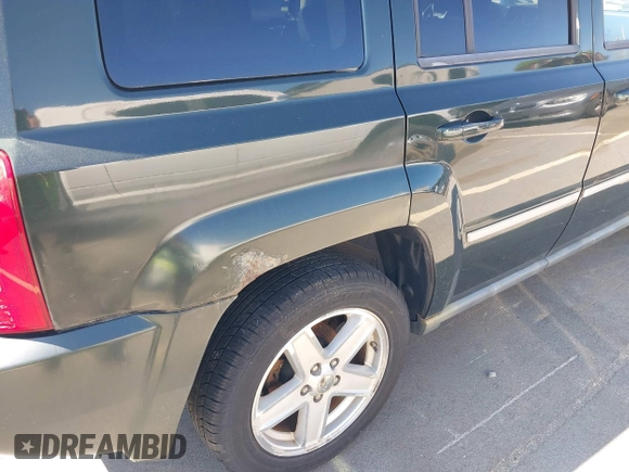 2010 Jeep Patriot Sport with VIN 1J4NF1GB3AD623781, listed as a IAAI auction lot 42053570 with 87,253 mi miles. Bid and sale history available at carsss.com. Image 6.