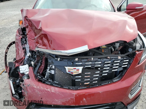 2022 Cadillac XT5 FWD Premium Luxury z VIN 1GYKNCRS9NZ130520, wystawiony jako Copart lot #47178275 z przebiegiem 8 564 mil mil oraz Szkoda całkowita • Salvage title. Historia ofert i sprzedaży dostępna na DreamBid. Obrazek 13.