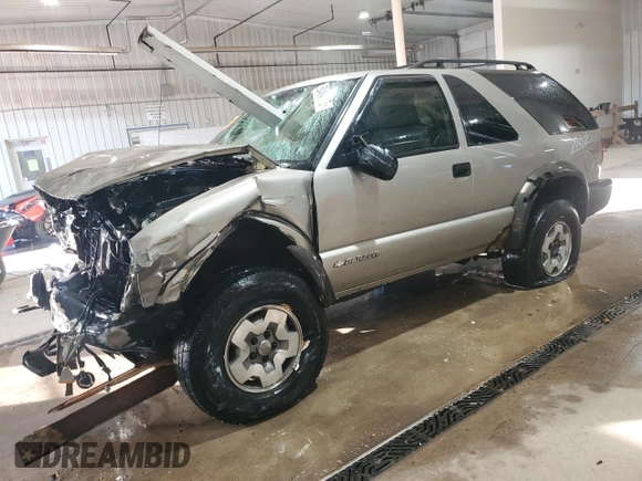 2004 Chevrolet Blazer LS z VIN 1GNCT18X34K143280, wystawiony jako Copart lot #50494785 z przebiegiem Nie podano mil oraz Szkoda całkowita • Salvage title. Historia ofert i sprzedaży dostępna na DreamBid. Obrazek 1.