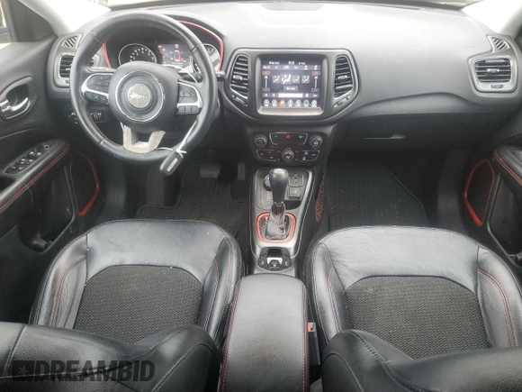 2018 Jeep Compass Trailhawk with VIN 3C4NJDDB6JT207289, listed as a Copart auction lot 56013675 with 83,385 mi miles and Salvage title. Bid and sale history available at DreamBid. Image 8.