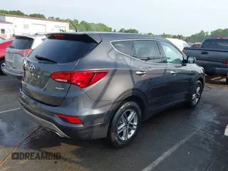 2018 Hyundai Santa Fe 2.4L with VIN 5XYZT3LB0JG525150, listed as a IAAI auction lot 42070377 with 142,418 mi miles and . Bid and sale history available at DreamBid. Image 4.