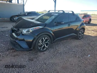 2018 Toyota C-HR XLE z VIN NMTKHMBX7JR044870, wystawiony jako Copart lot #62604875 z przebiegiem 154 619 mil mil oraz Szkoda całkowita • Salvage title. Historia ofert i sprzedaży dostępna na DreamBid. Obrazek 1.