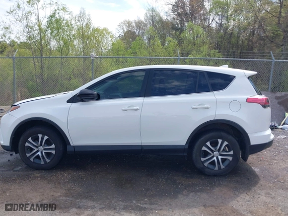 2018 Toyota RAV4 LE with VIN JTMZFREV9JJ192075, listed as a IAAI auction lot 41860513 with 64,586 mi miles. Bid and sale history available at carsss.com. Image 14.