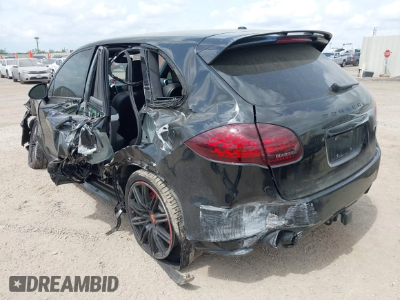 2014 Porsche Cayenne GTS with VIN WP1AD2A25ELA71350, listed as a IAAI auction lot 42031766 with 104,184 mi miles and . Bid and sale history available at DreamBid. Image 3.
