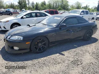 1997 Lexus SC 400 z VIN JT8CH32YXV0052087, wystawiony jako Copart lot #58088555 z przebiegiem 171 685 mil mil oraz Tytuł czysty. Historia ofert i sprzedaży dostępna na DreamBid. Obrazek 1.