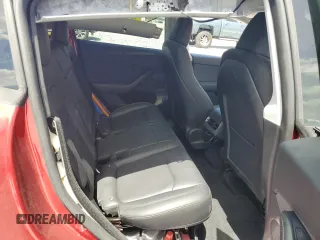 2024 Tesla Model Y Performance with VIN 7SAYGDEF1RF052175, listed as a Copart auction lot 51743895 with 4,869 mi miles and Salvage Title. Bid and sale history available at DreamBid. Image 10.